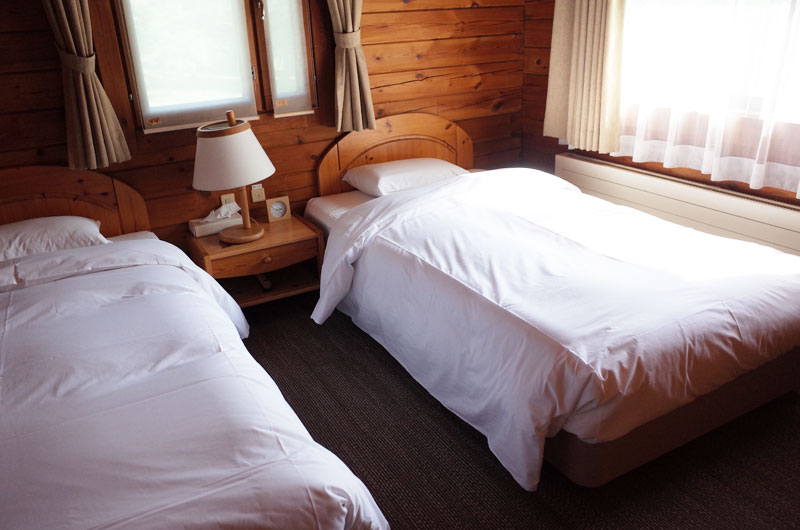 軽井沢プリンスホテルコテージのベッドルーム